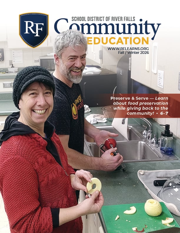 photo of man and woman with apples in a kitchen